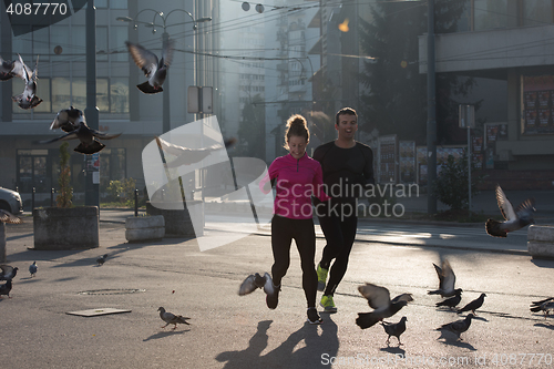 Image of young  couple jogging