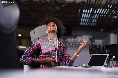 Image of portrait of a young successful African-American woman in modern 