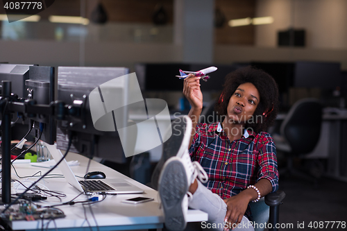 Image of portrait of a young successful African-American woman in modern 