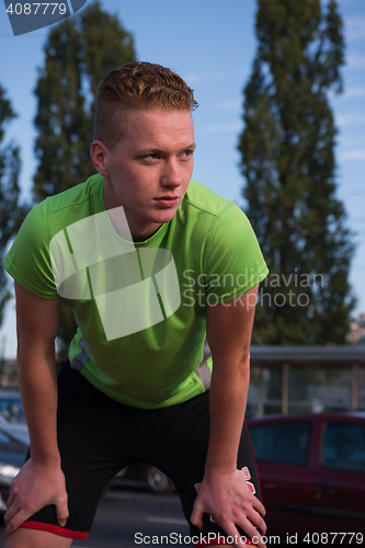 Image of portrait of a young man on jogging