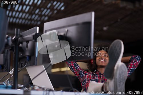Image of portrait of a young successful African-American woman in modern 