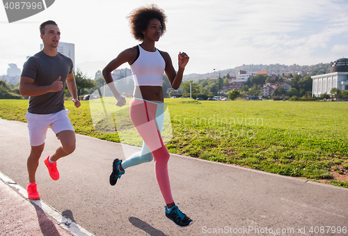 Image of multiethnic group of people on the jogging