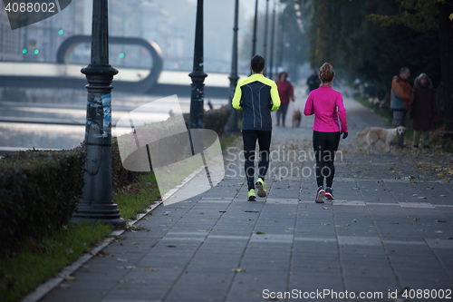 Image of young  couple jogging