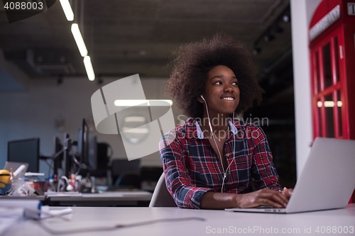 Image of portrait of a young successful African-American woman in modern 