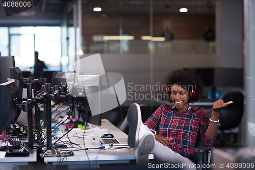 Image of portrait of a young successful African-American woman in modern 