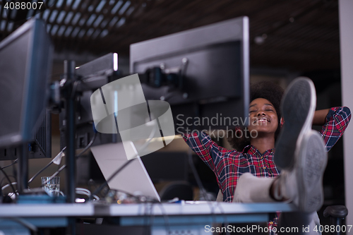 Image of portrait of a young successful African-American woman in modern 