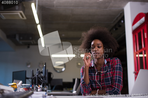 Image of portrait of a young successful African-American woman in modern 