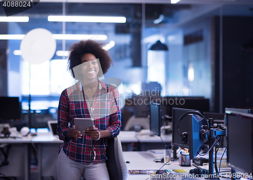 Image of portrait of a young successful African-American woman in modern 
