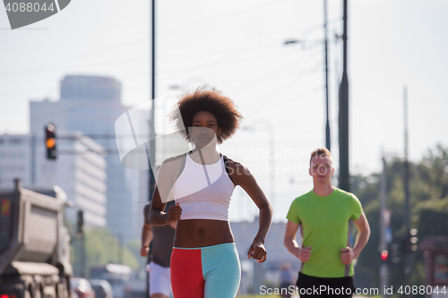 Image of multiethnic group of people on the jogging