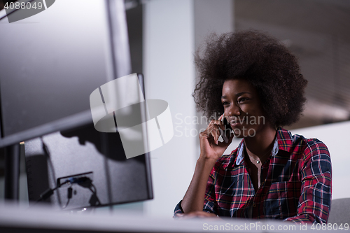 Image of portrait of a young successful African-American woman in modern 