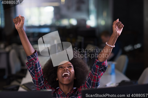 Image of portrait of a young successful African-American woman in modern 
