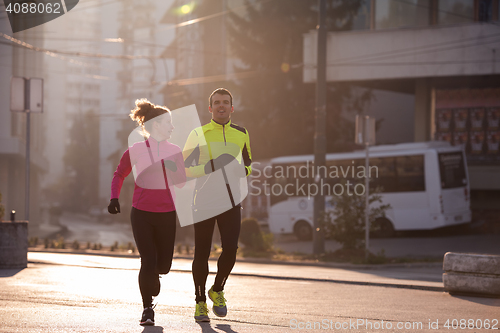 Image of young  couple jogging