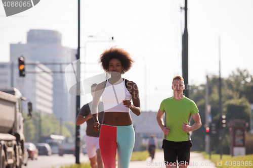 Image of multiethnic group of people on the jogging