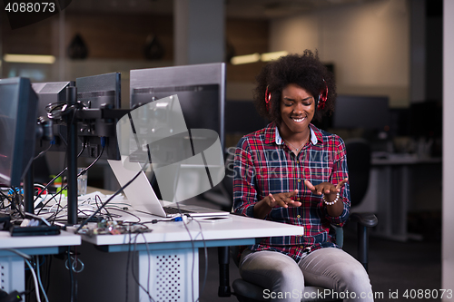 Image of portrait of a young successful African-American woman in modern 