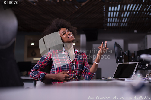 Image of portrait of a young successful African-American woman in modern 