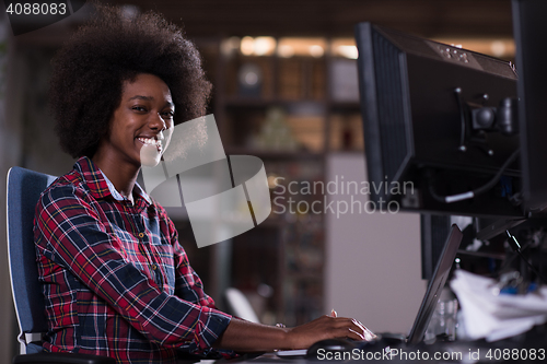 Image of portrait of a young successful African-American woman in modern 