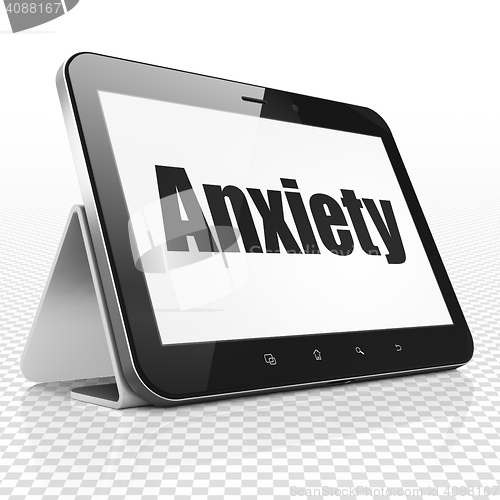 Image of Healthcare concept: Tablet Computer with Anxiety on display