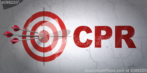 Image of Medicine concept: target and CPR on wall background