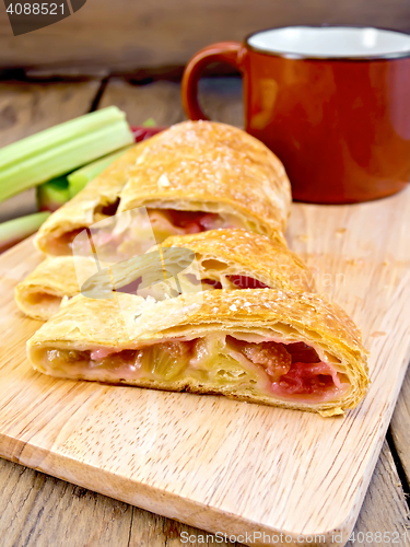 Image of Strudel with rhubarb on wooden board