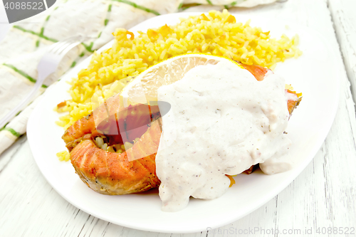 Image of Salmon with rice on board