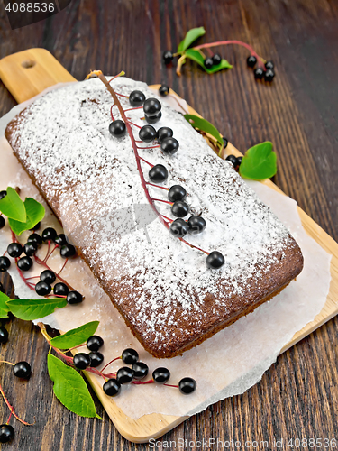 Image of Fruitcake bird cherry with berries on board