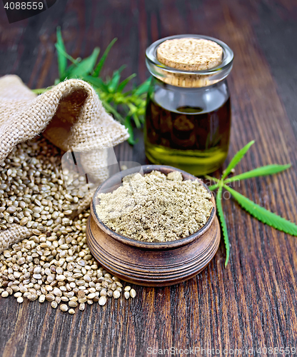 Image of Flour hemp in bowl with oil on dark board