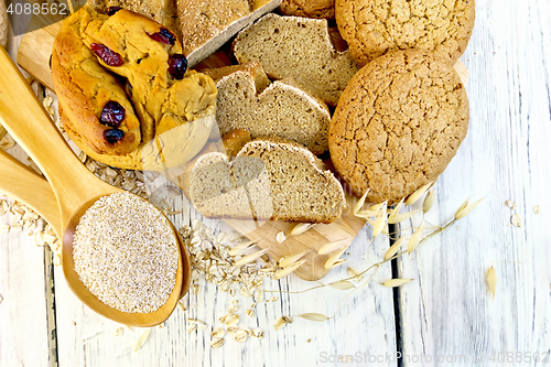 Image of Bread and biscuits oat with bran on board top