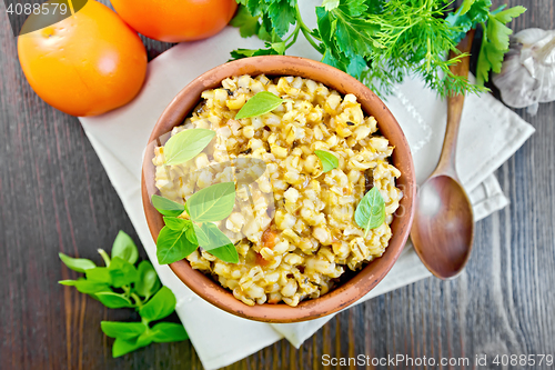 Image of Barley porridge with basil on board top