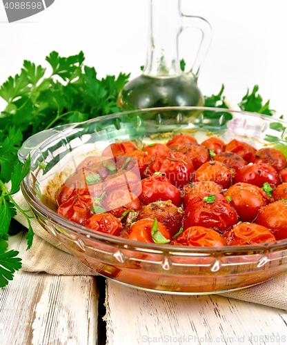Image of Tomatoes baked in pan on light board