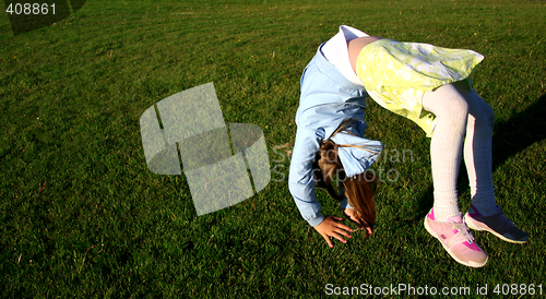 Image of Girl doing somersault