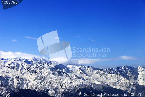 Image of Sunlight snowy mountains at winter sun day