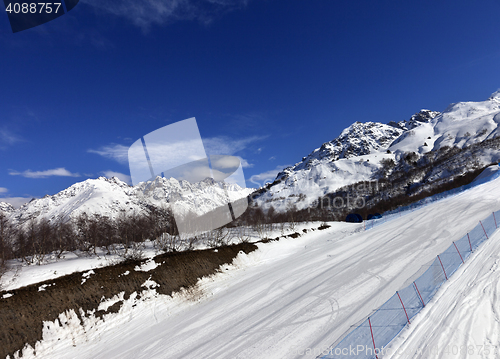 Image of Ski slope in sun day