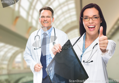 Image of Doctors or Nurses Holding X-ray Inside Hospital