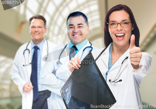 Image of Doctors or Nurses Holding X-ray Inside Hospital