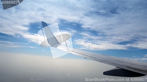 Image of Airplane wingon the sky