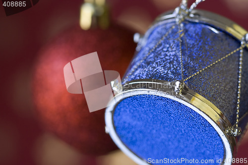 Image of Christmas ball and drum background (selective and soft focus)