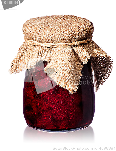 Image of Currant jam in jar with burlap