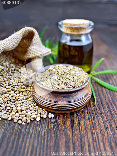 Image of Flour hemp in bowl with oil on board