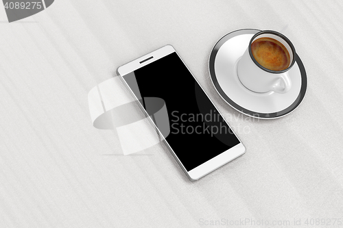 Image of Smartphone and coffee cup
