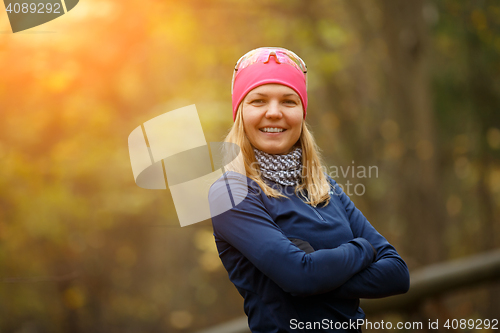 Image of Girl in sportswear at forest