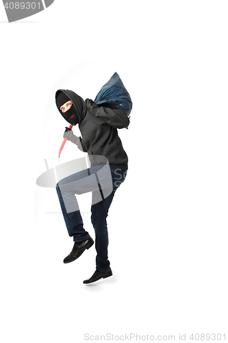 Image of Thief with passkey in hand