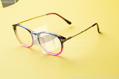 Image of Blue and pink rim of glasses