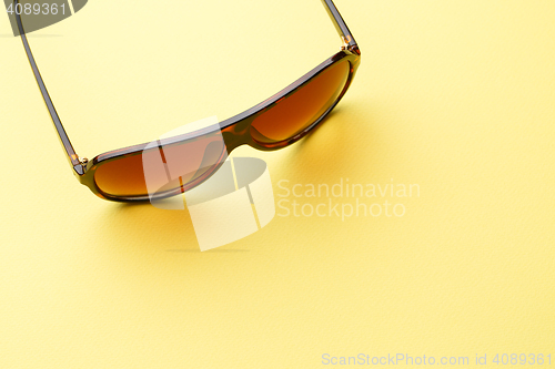 Image of Goggles in empty yellow background