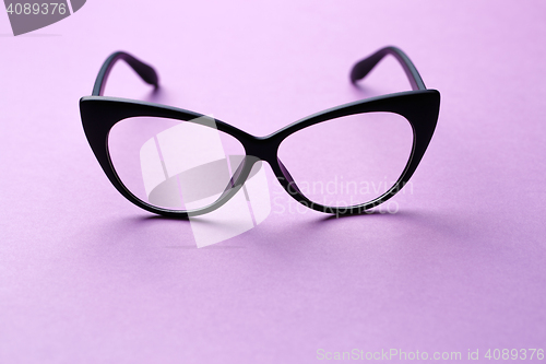 Image of Black-rimmed glasses with clear lenses