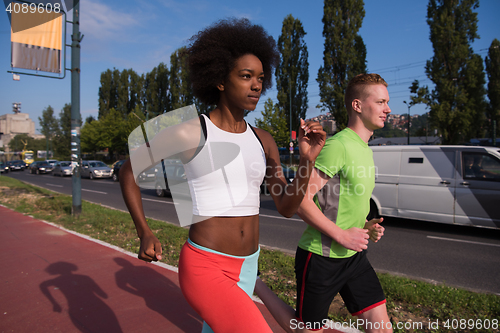 Image of multiethnic group of people on the jogging