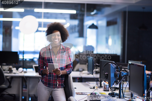 Image of portrait of a young successful African-American woman in modern 