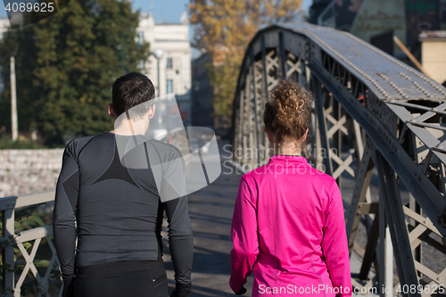 Image of young  couple jogging