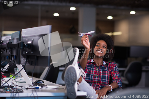 Image of portrait of a young successful African-American woman in modern 