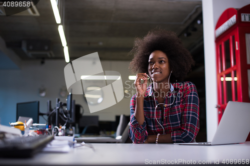 Image of portrait of a young successful African-American woman in modern 