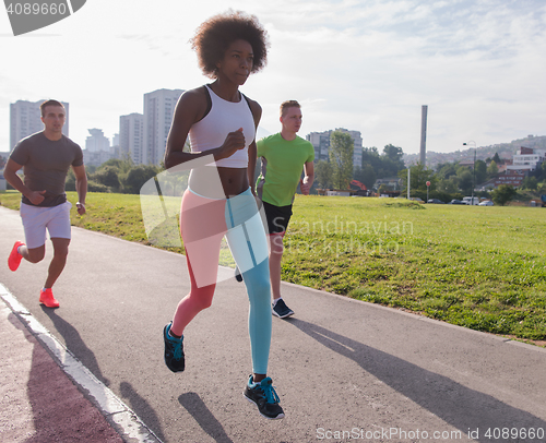 Image of multiethnic group of people on the jogging